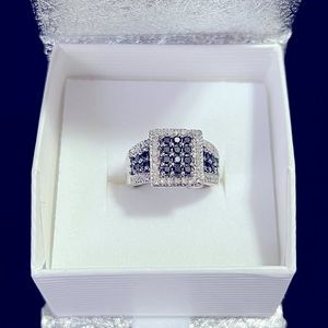 SLIGHTLY USED WHITE GOLD UNISEX RING SIZE 5.5 WITH WHITE AND BLACK DIAMONDS